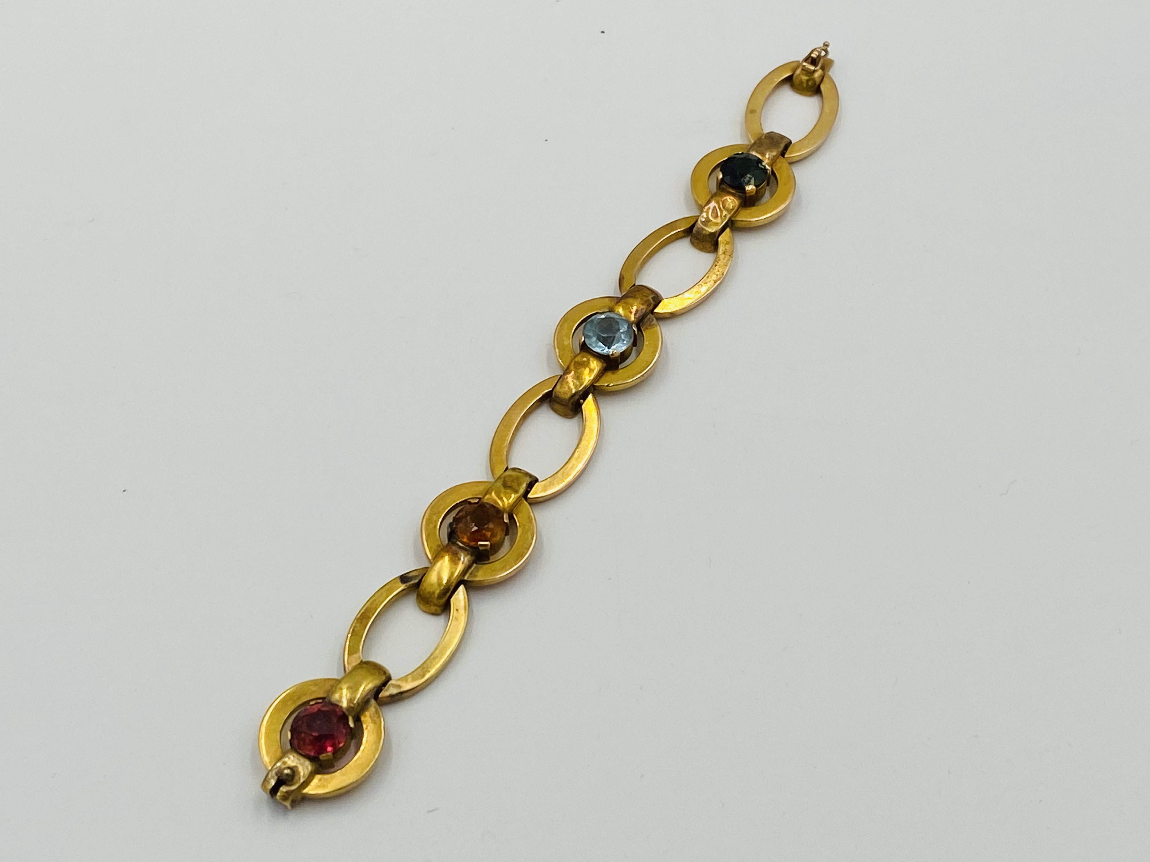 14ct gold bracelet set with coloured stones