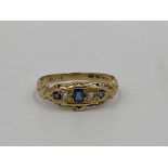 18ct gold ring set with sapphires and diamonds