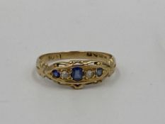 18ct gold ring set with sapphires and diamonds