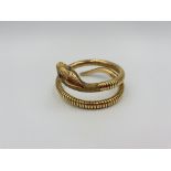 9ct gold, steel sprung snake bracelet