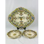 Majolica serving platter, 50cm; together with a pair of majolica plates.