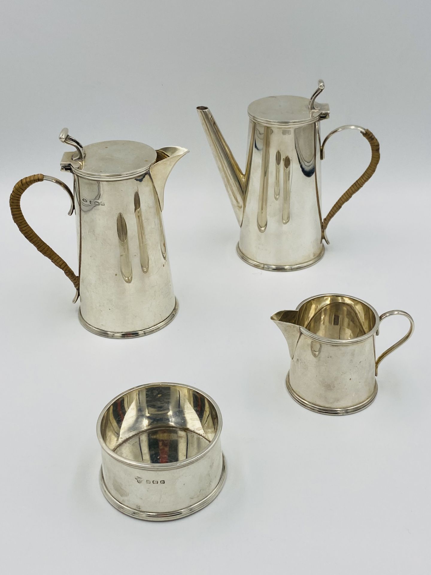 Three piece silver coffee set, retailed by Harrods; together with a silver hot water jug to match - Image 8 of 8
