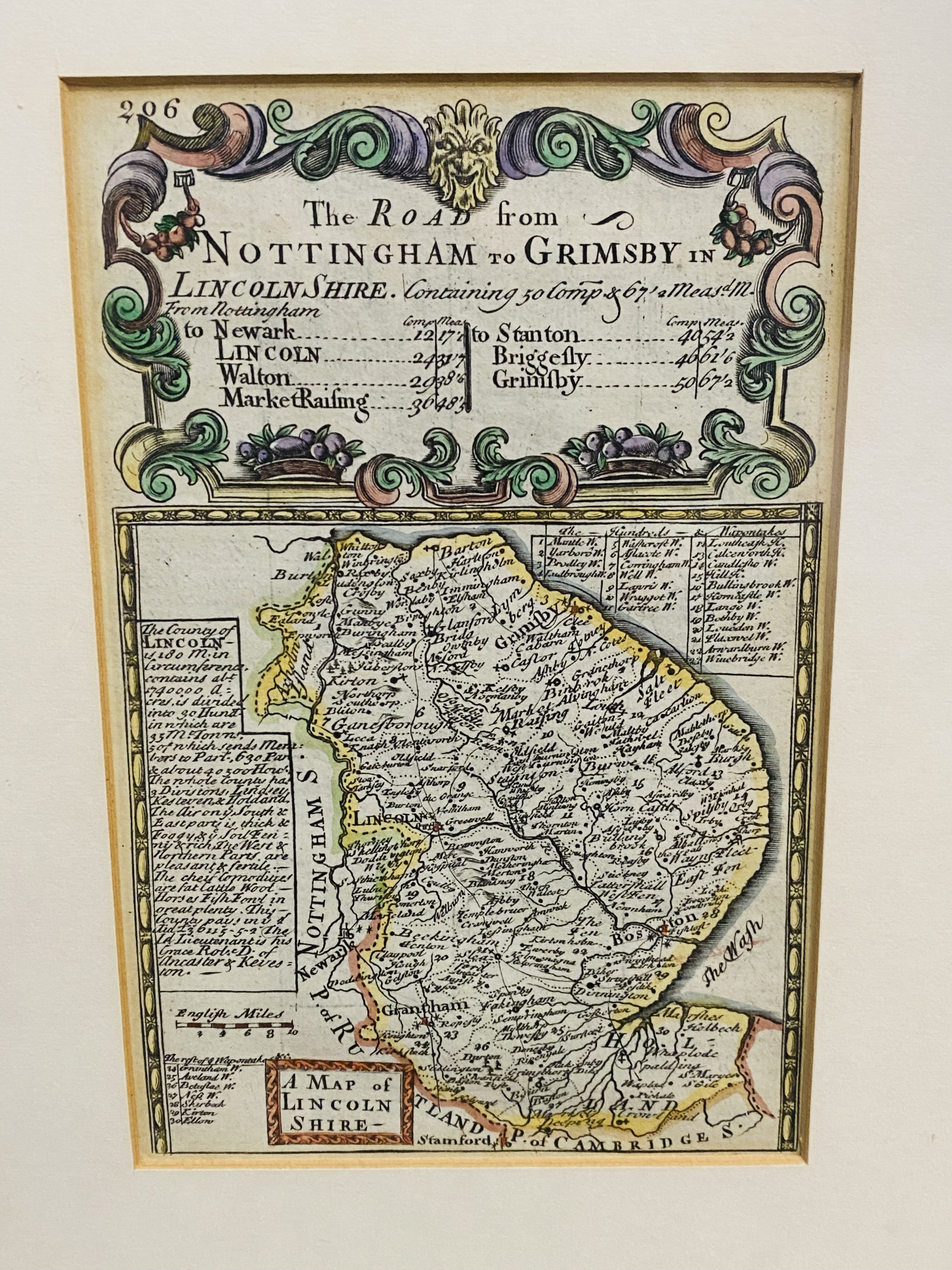 Three framed and glazed maps; together with two further prints