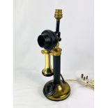 Brass stick phone converted to table lamp.