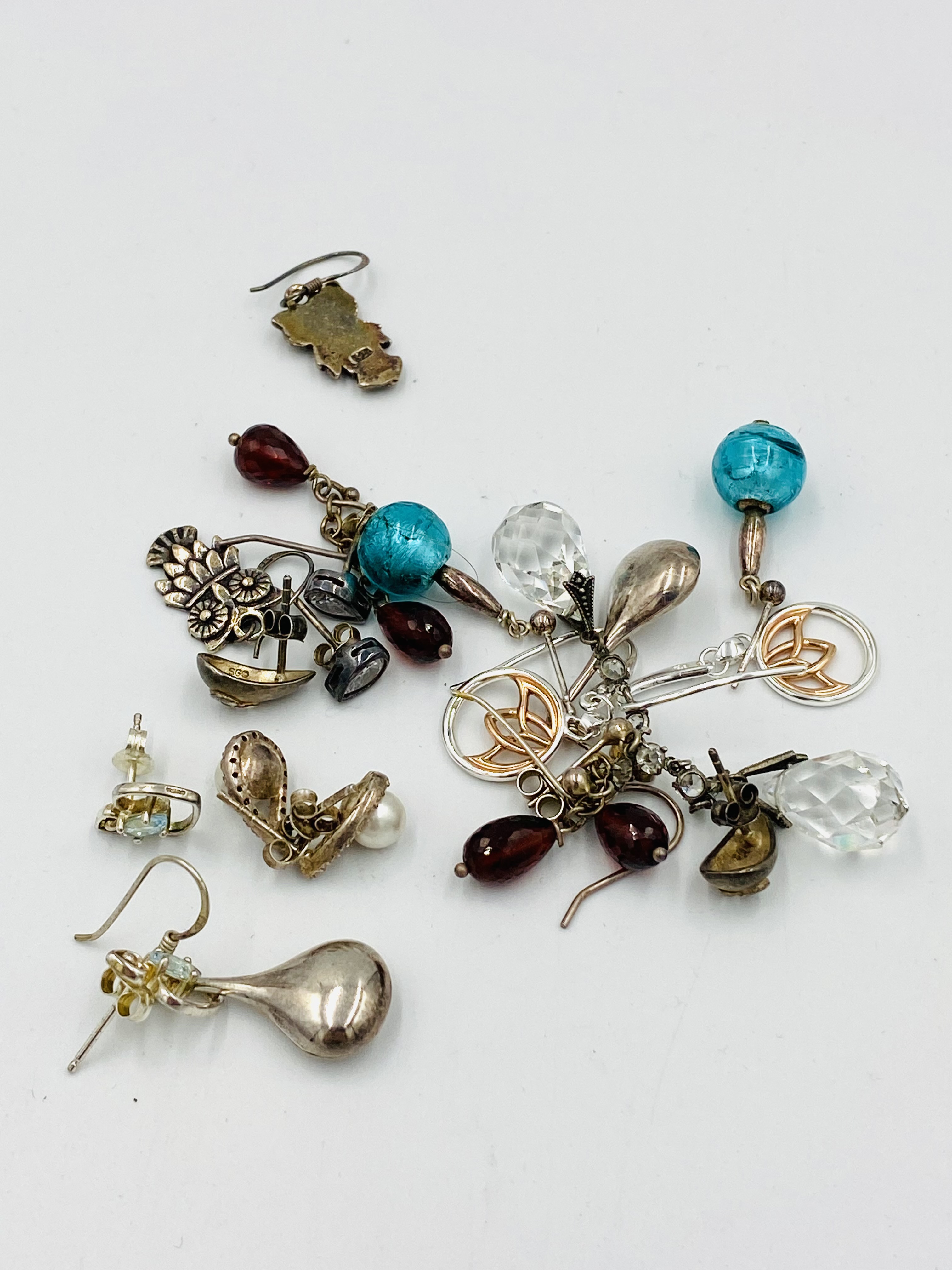 Ten pairs of sterling silver earrings