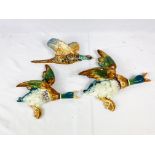 Two ceramic flying ducks and a ceramic flying pheasant
