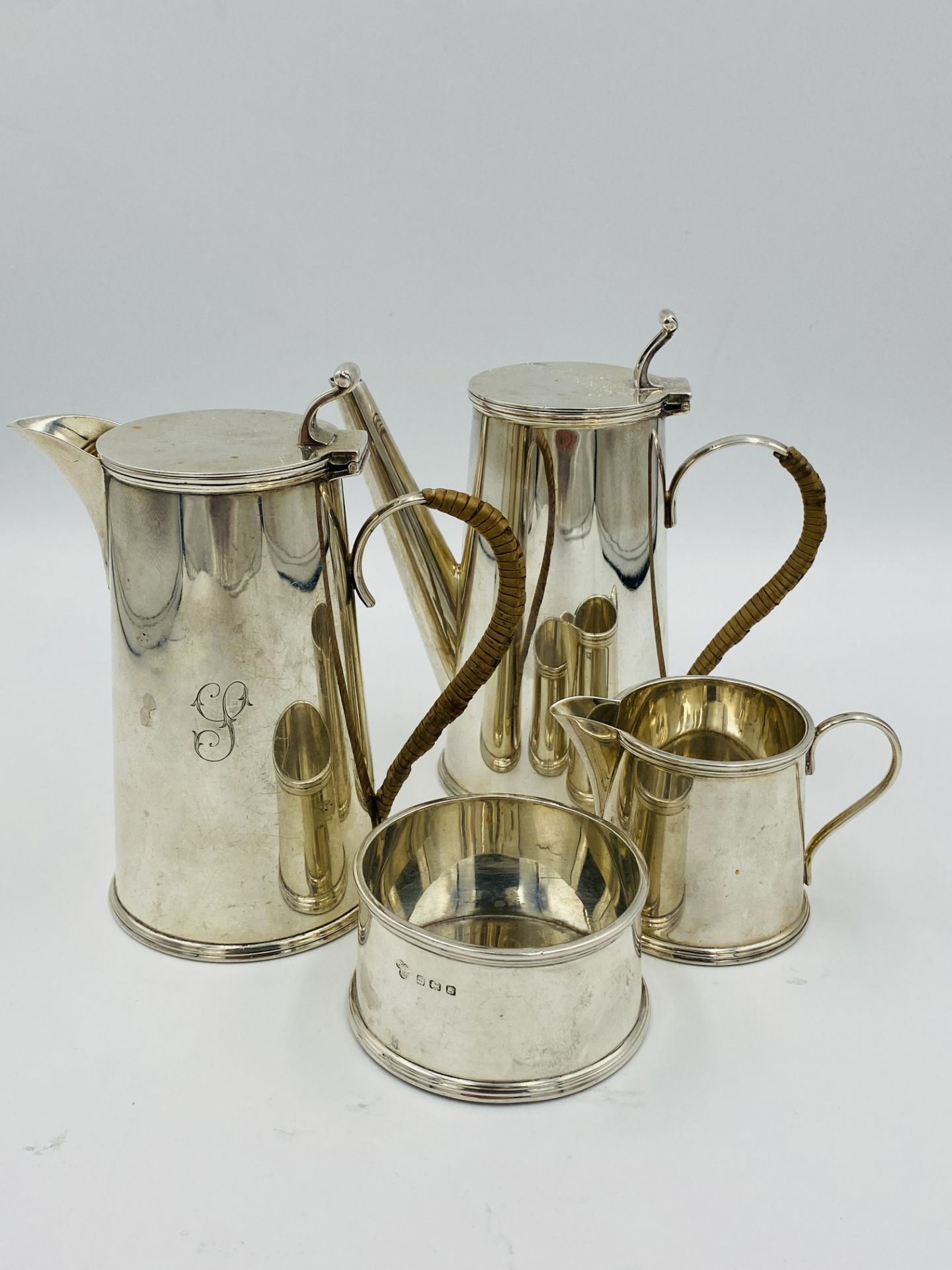 Three piece silver coffee set, retailed by Harrods; together with a silver hot water jug to match - Image 3 of 8