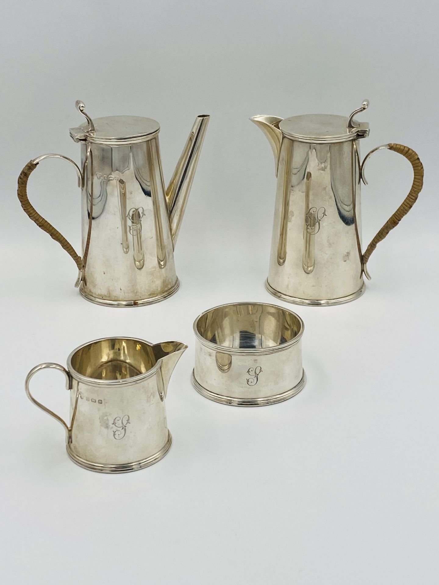 Three piece silver coffee set, retailed by Harrods; together with a silver hot water jug to match - Image 4 of 8