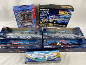 Two Battleship & Submarine Naval Strike Mission sets; Playmobil Back to the Future, Quad-core drone.