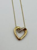 9ct gold heart shaped pendant on 9ct gold chain