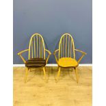 Two Ercol open armchairs