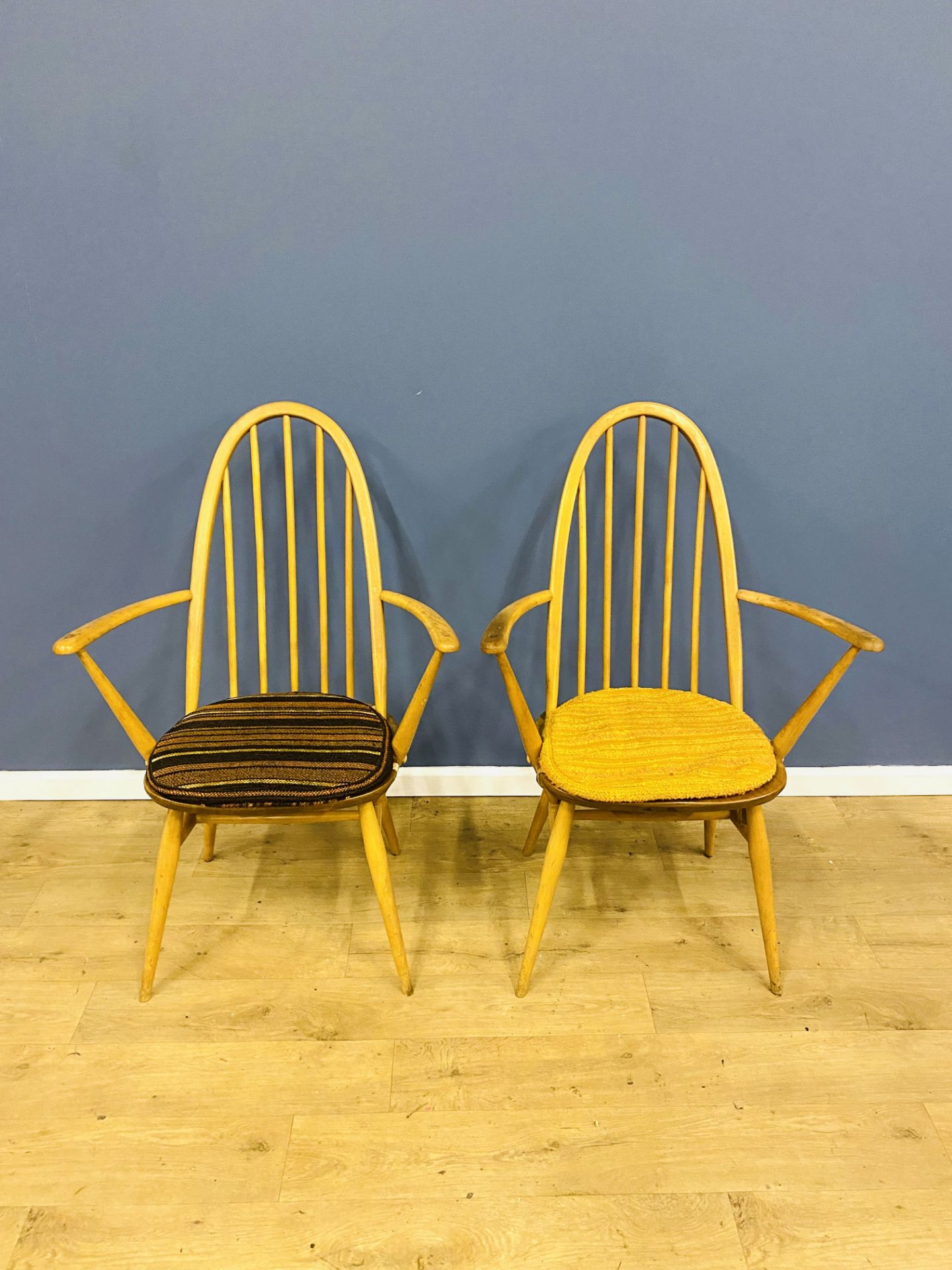 Two Ercol open armchairs