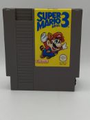 Nintendo NES Super Mario 3 cartridge, with instructions