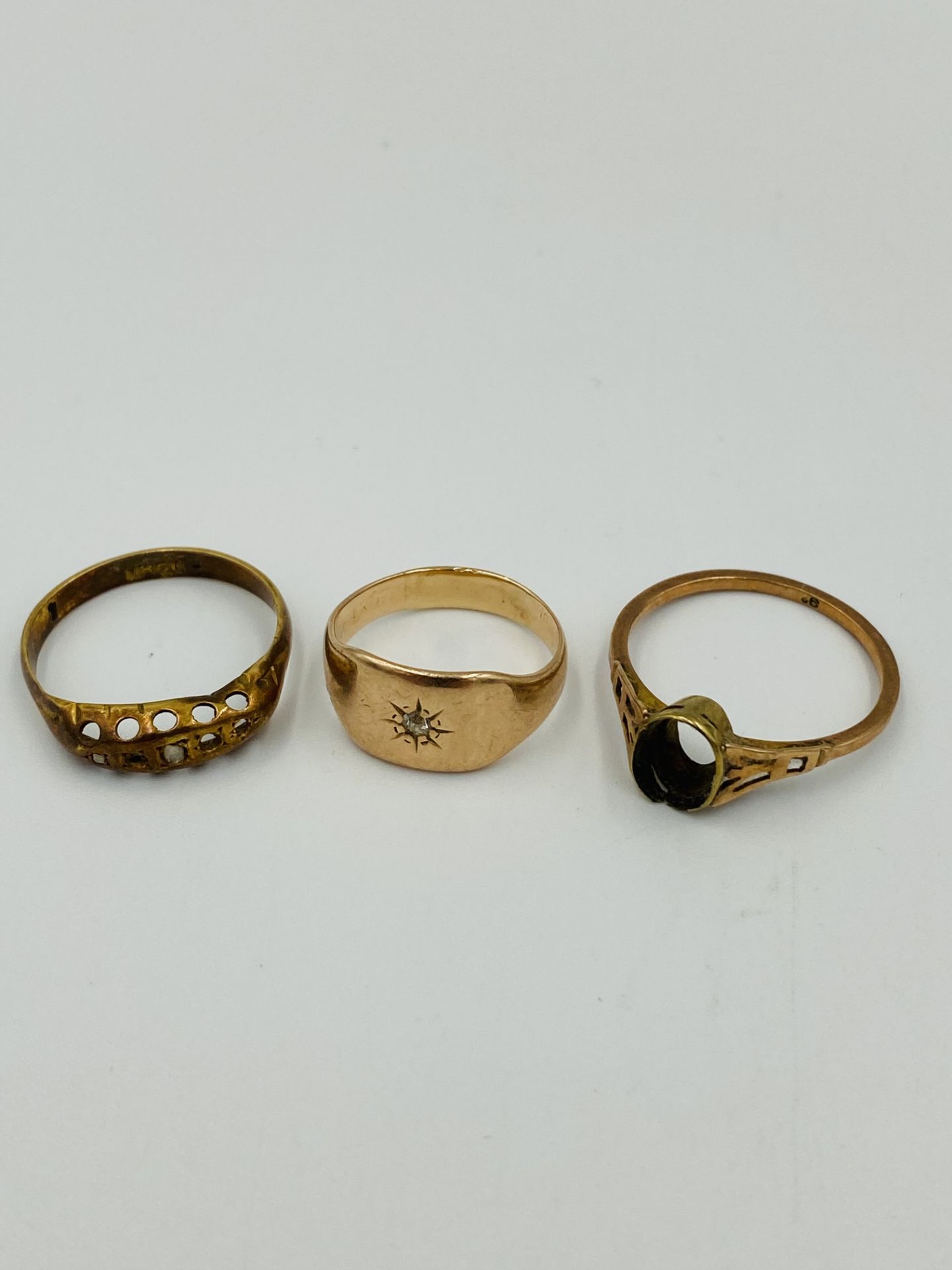 Two gold rings together with a yellow metal ring - Image 3 of 3