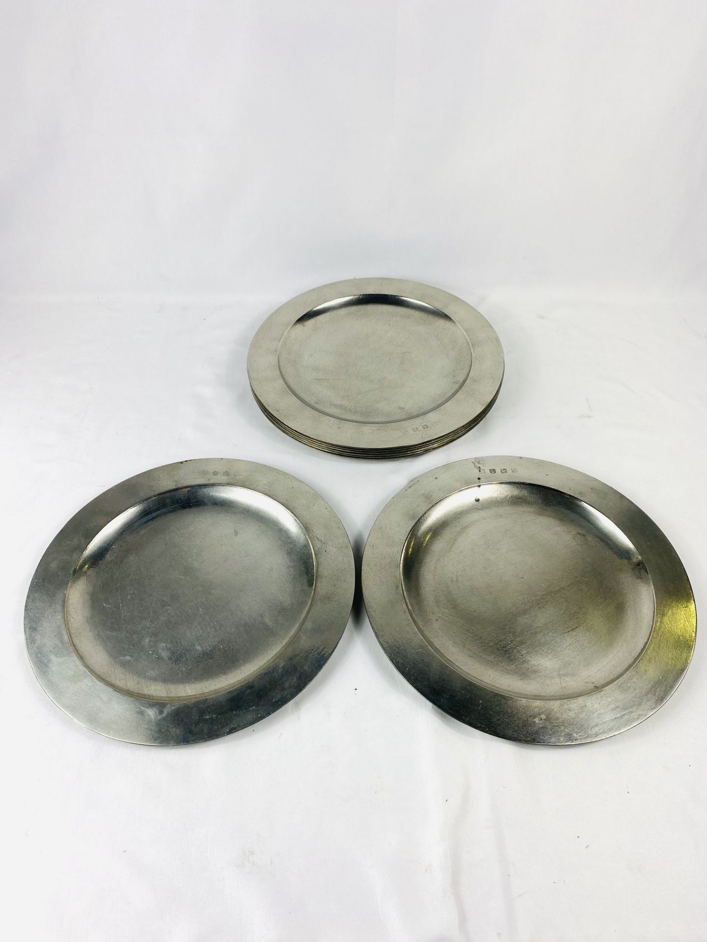 Eight James Yates pewter plates