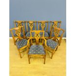 Seven oak splat back dining chairs