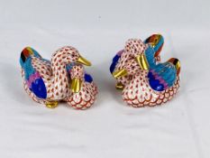 Two Herend pottery pairs of ducks,