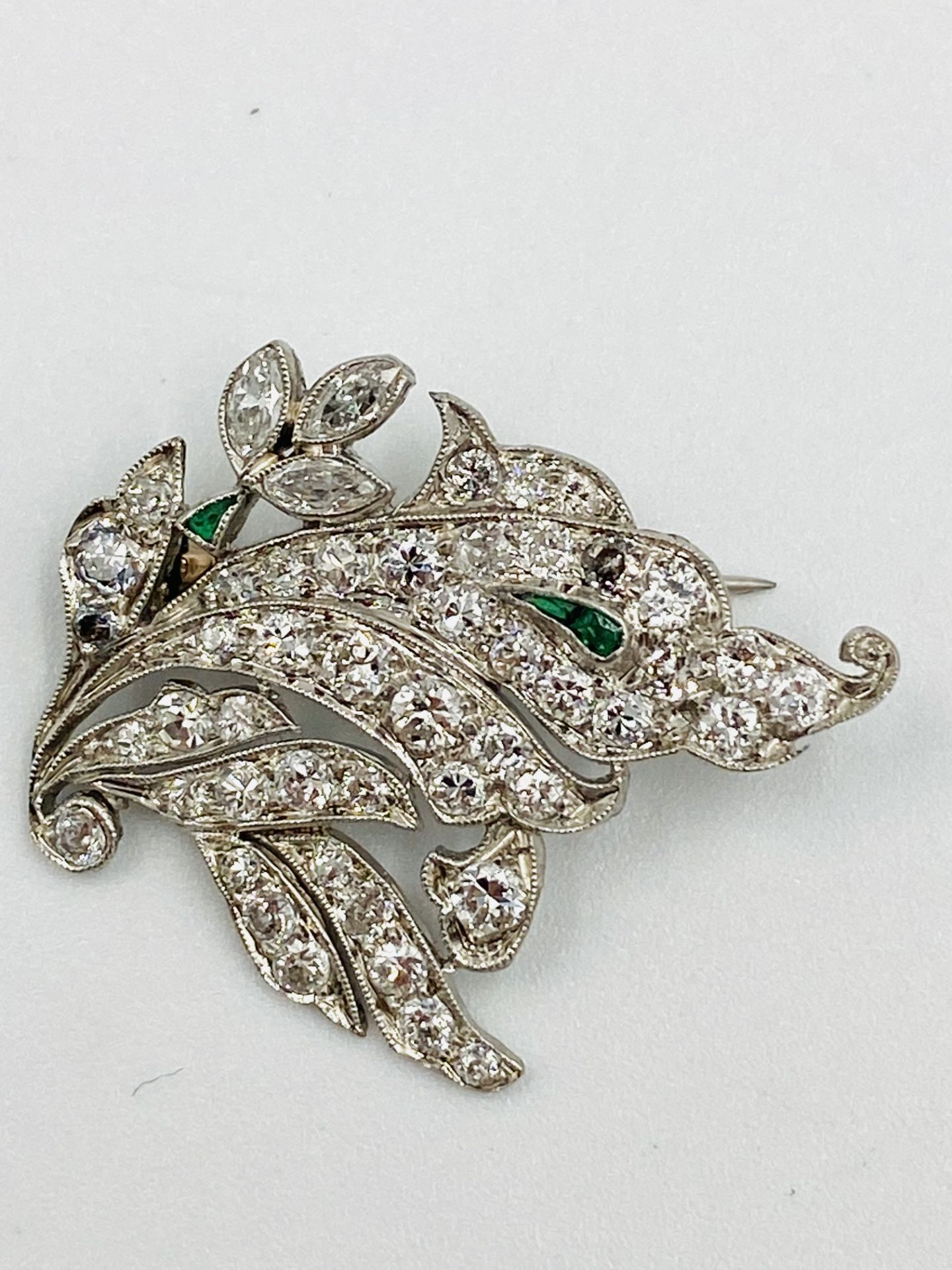 Emerald and diamond brooch