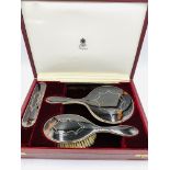 Four piece silver and tortoiseshell dressing table set retailed by Asprey