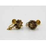 A pair of 9ct gold earrings