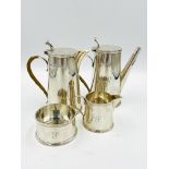 Three piece silver coffee set, retailed by Harrods; together with a silver hot water jug to match