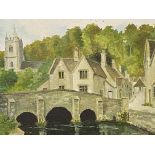 Framed oil on canvas of a village and river scene