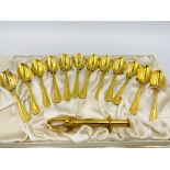 A set of gold plated coffee spoons and other items