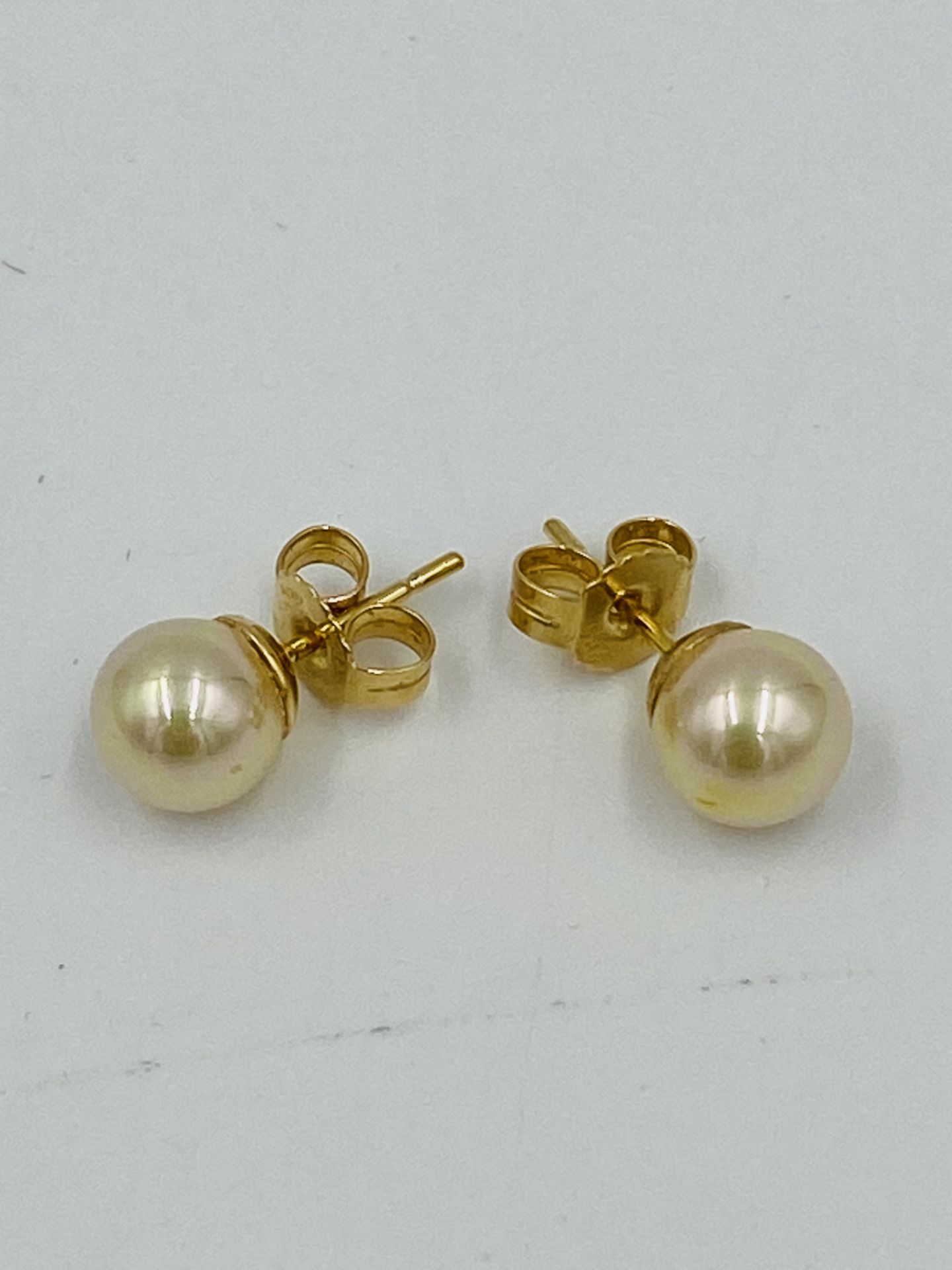 Pair of 18ct gold earrings set with a pearl - Image 2 of 4