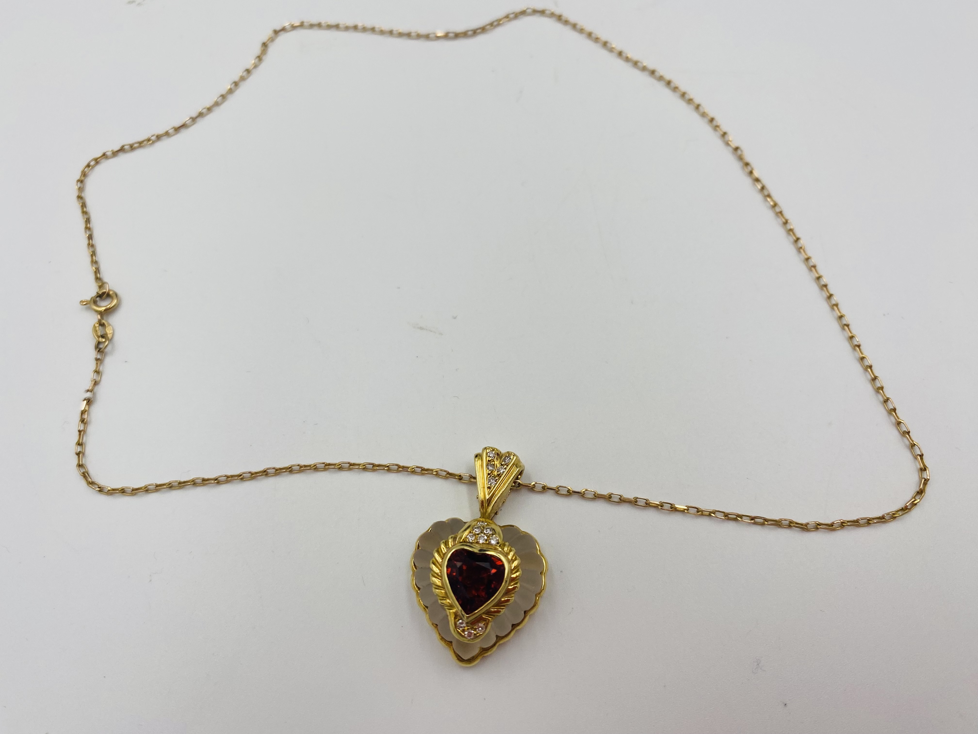 Rock crystal heart shaped pendant with 18ct gold mount - Image 6 of 6