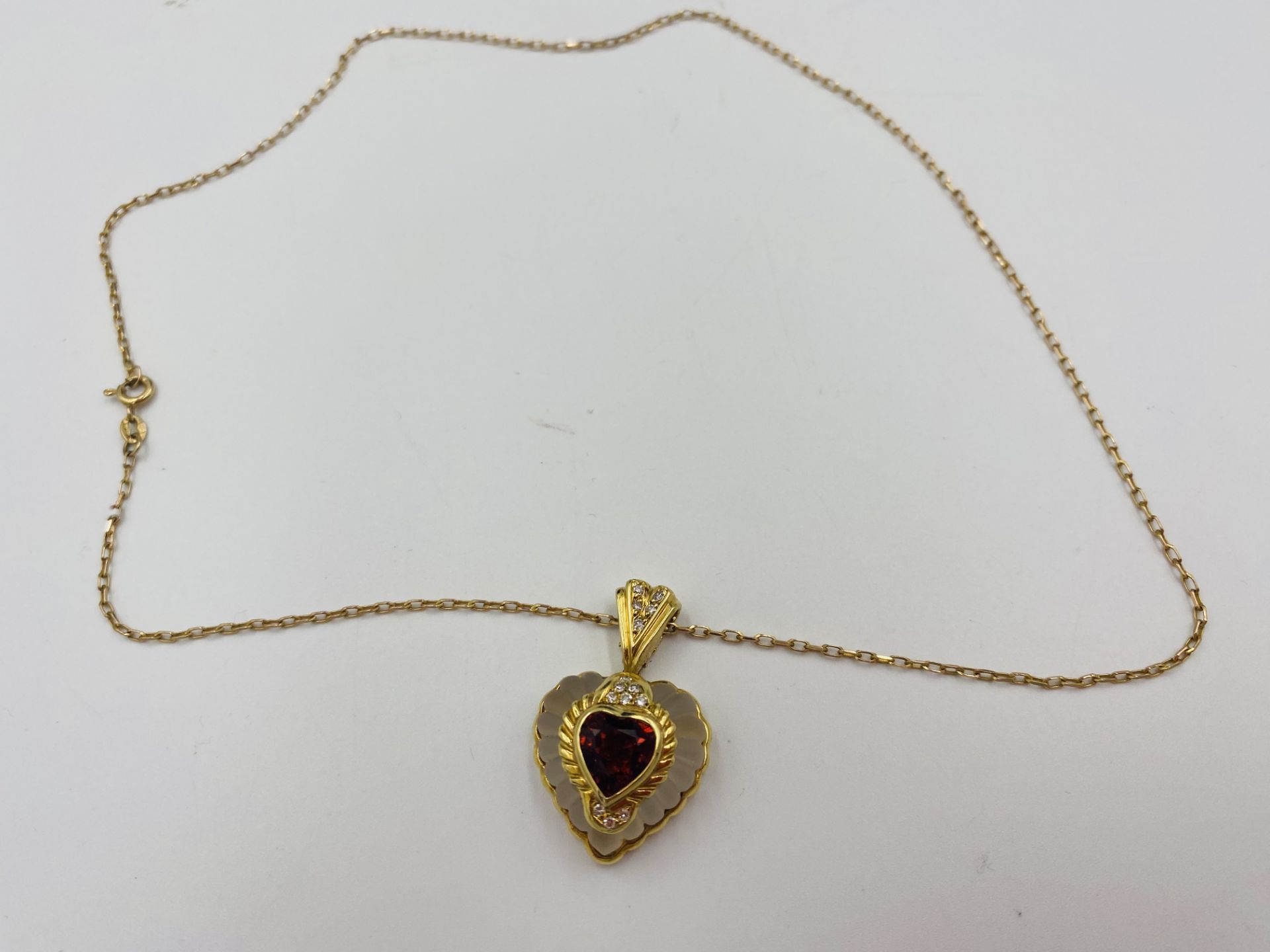 Rock crystal heart shaped pendant with 18ct gold mount - Image 6 of 6