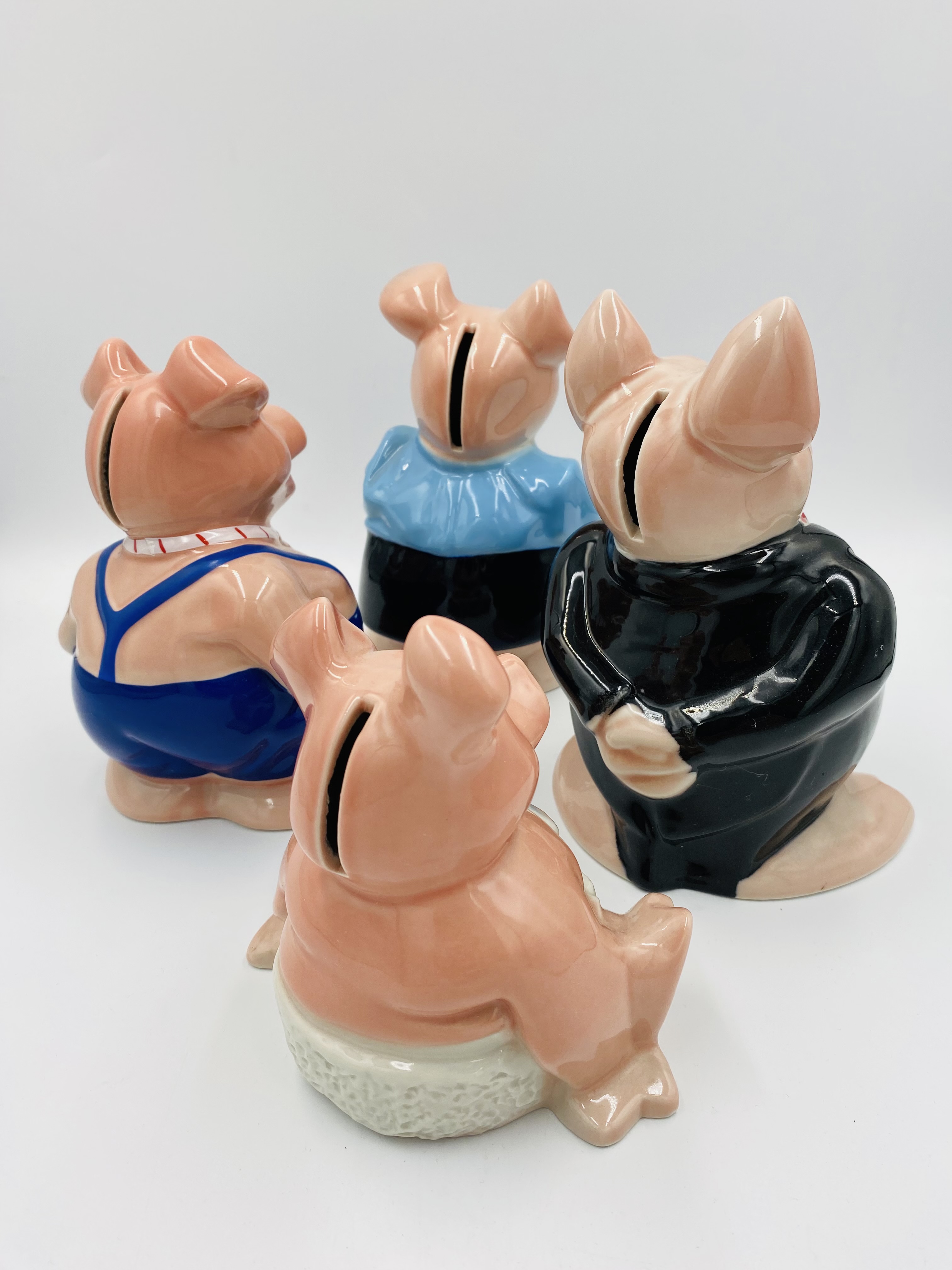 Four Natwest pig money boxes - Image 3 of 3