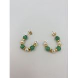 Pair of 9ct gold and pearl earrings