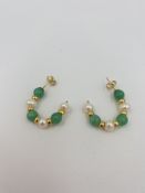 Pair of 9ct gold and pearl earrings