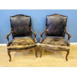Two bow fronted mahogany open armchairs