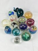 Seven Caithness paperweights together with six other glass paperweights