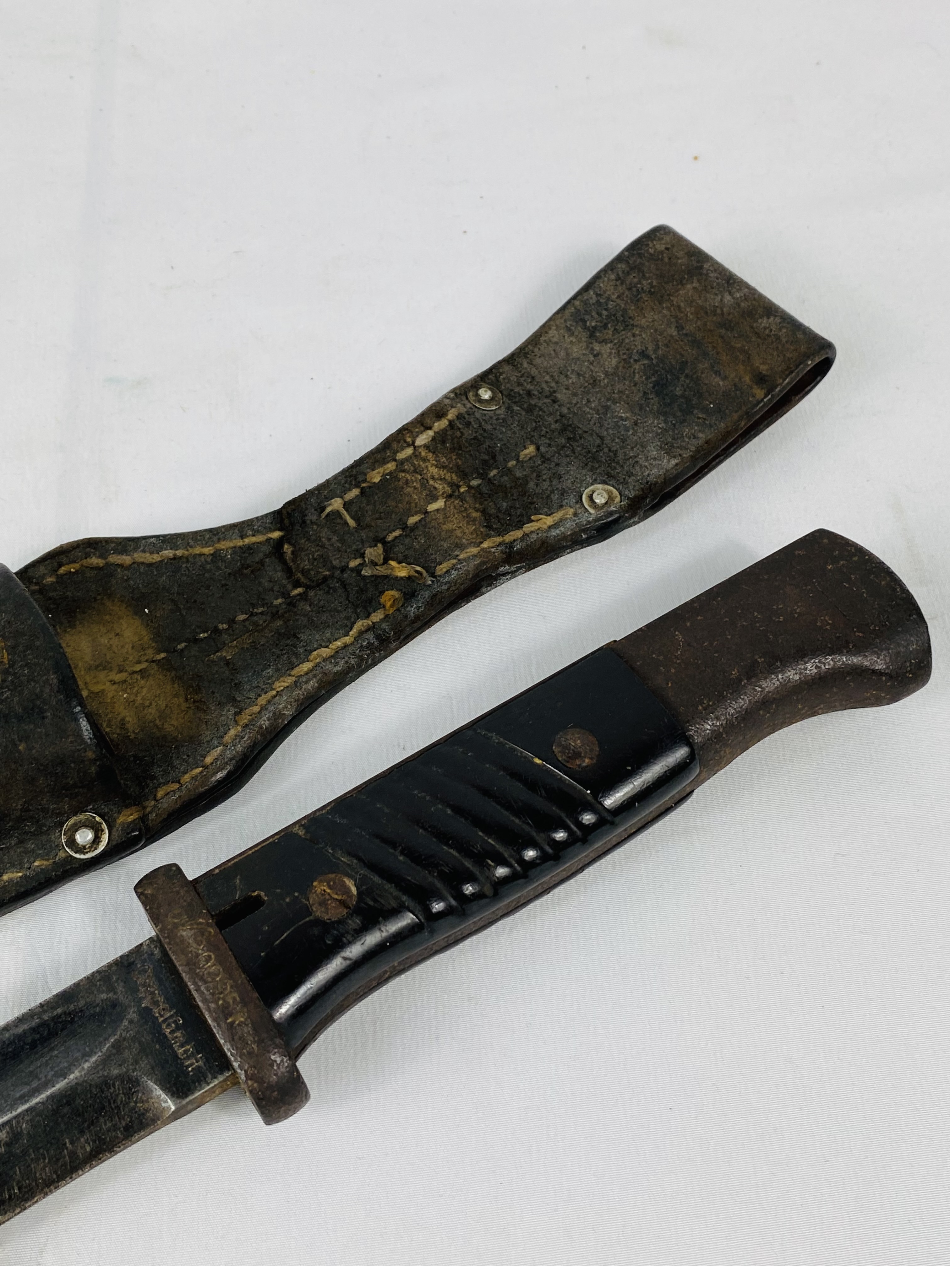 World War II bayonet written to blade Coppell G.m.b.H N20995K in leather scabbard. - Image 3 of 4