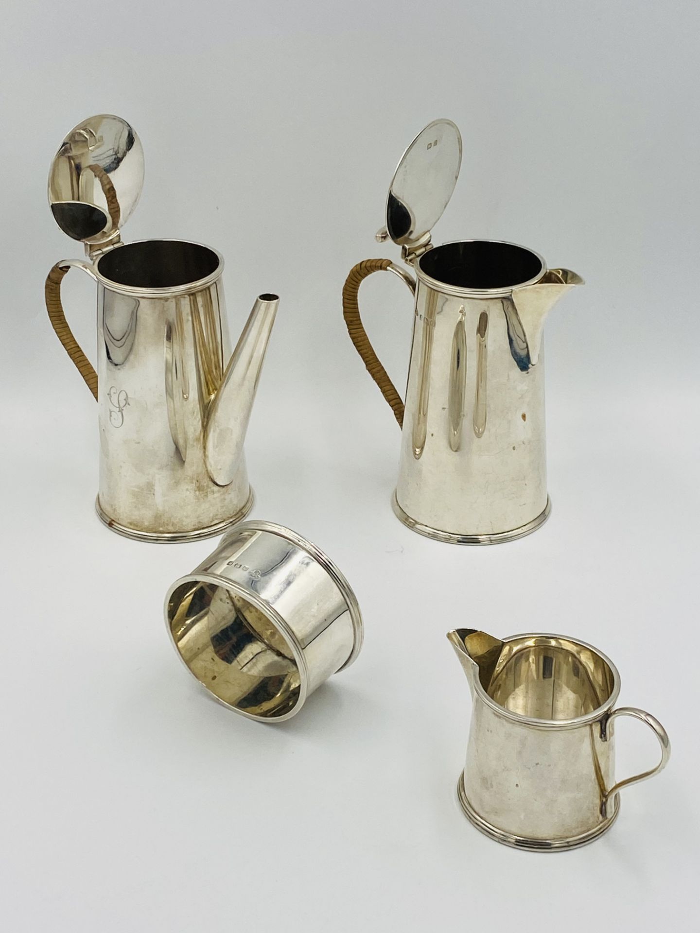 Three piece silver coffee set, retailed by Harrods; together with a silver hot water jug to match - Image 5 of 8