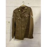 Army dress jacket together with a sailor's dress jacket and cap