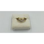 9ct gold ring together with a similar yellow metal ring