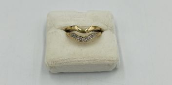 9ct gold ring together with a similar yellow metal ring