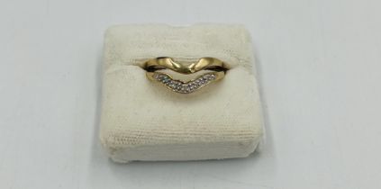 9ct gold ring together with a similar yellow metal ring