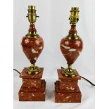 Pair of red marble table lamps