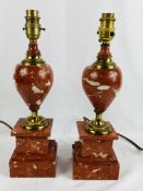 Pair of red marble table lamps