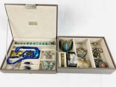 Two boxes of silver and white metal jewellery.