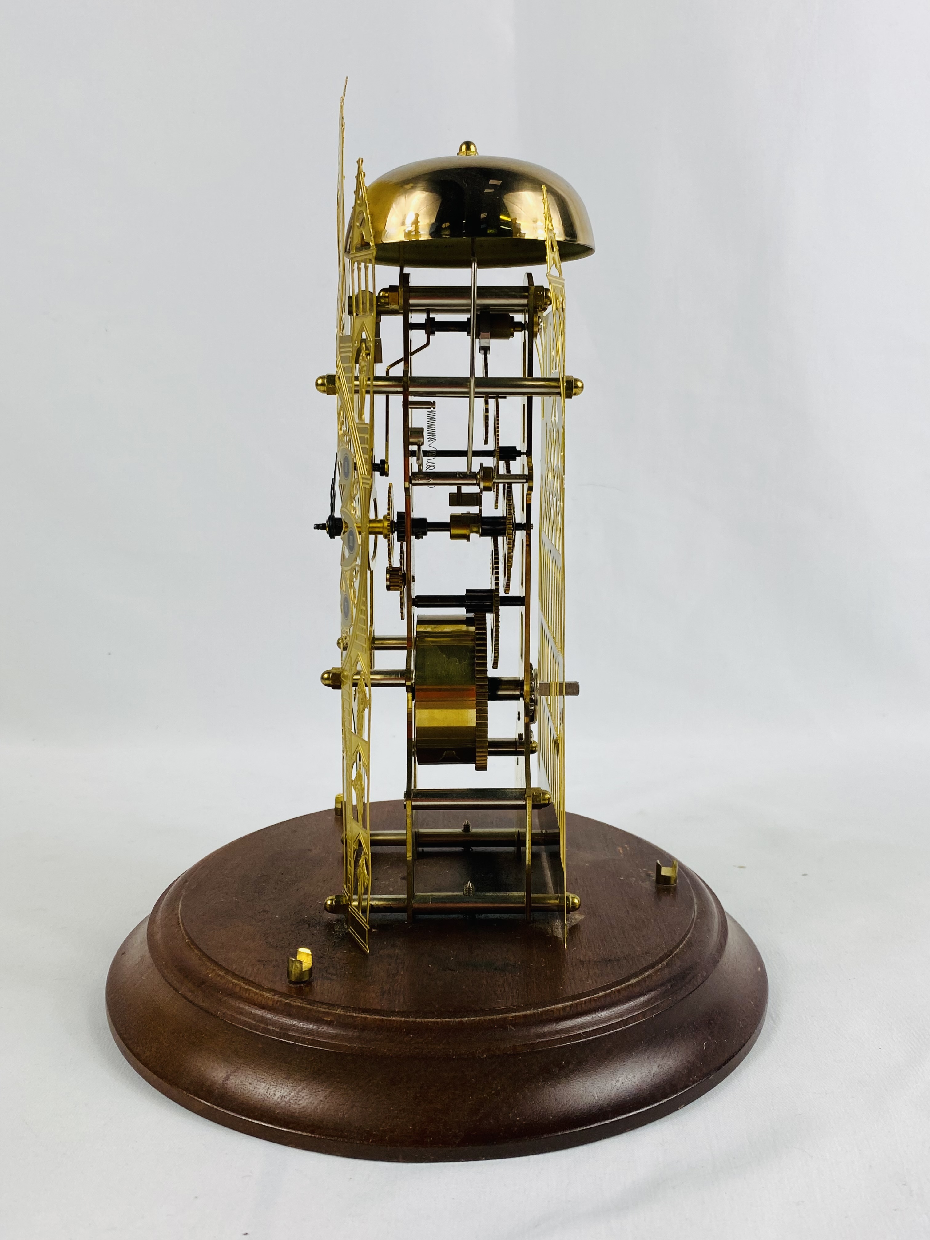 Brass skeleton clock on wood base - Image 6 of 6