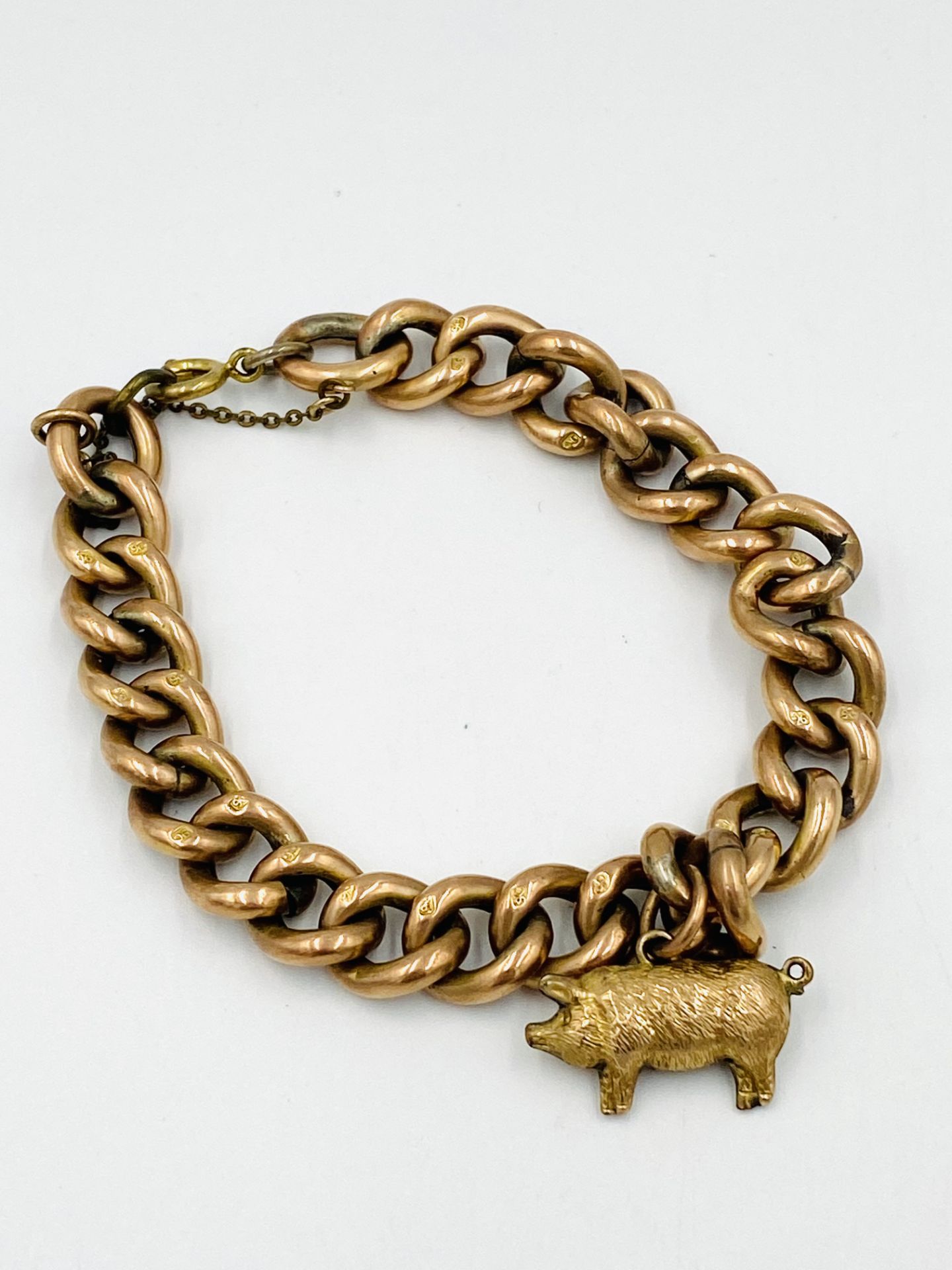 9ct gold bracelet with pig charm