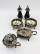 Pair of silver salts, two silver pepper pots and two silver mustard pots