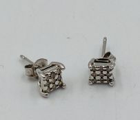 Pair of 9ct gold and diamond earrings