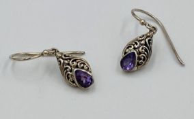 Pair of silver and amethyst earrings.