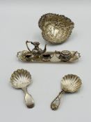 Miniature four piece silver tea set on matching tray and other items